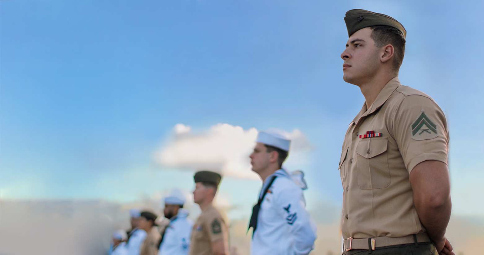 Sailors standing on deck