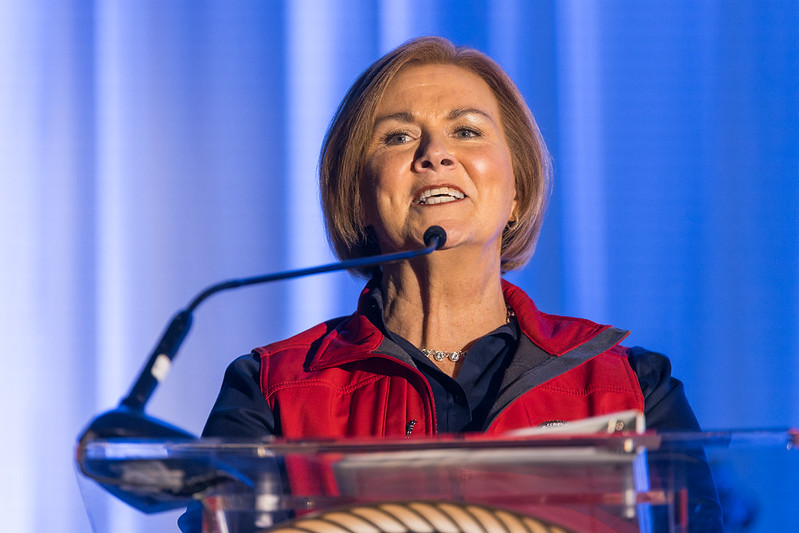 Dawn Cutler speaks at the podium