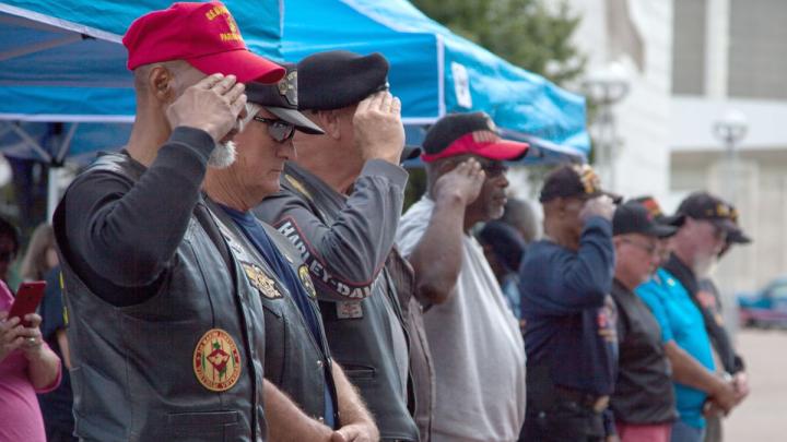 Retired military veterans saluting