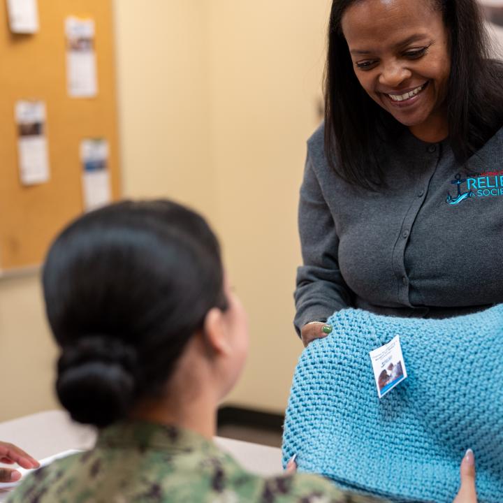 B4B instructor gifting a blanket to class attendee