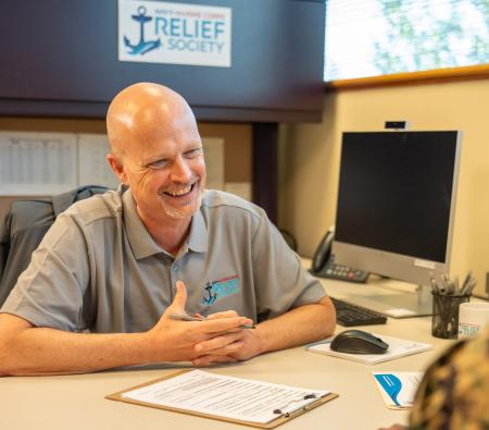 NMCRS caseworker helping a service member